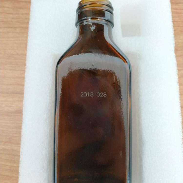 Laser marking of vinegar bottle